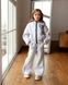 Спортивний костюм Спорт з накаткою попереду для дівчинки від Mini Queenie &mdash; вигляд 1